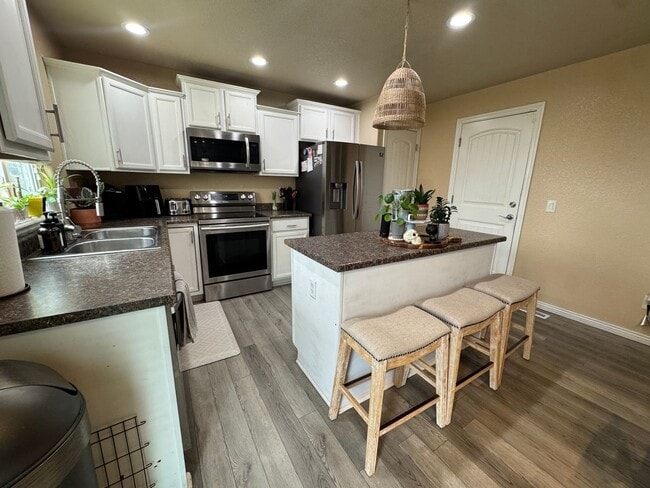 Photo - Modern 3BR/3BA Two-Story Home with Open Layout, Stainless Steel Kitchen & Low-Maintenance Living