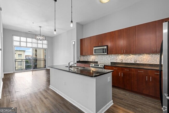 Building Photo - 711 Cosmopolitan Dr NE Unit 428 Rental