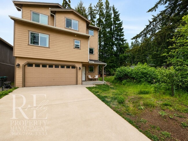 Photo - Spacious 3-Story Home with Flexible Living Space, Heat Pump & Private Deck Retreat