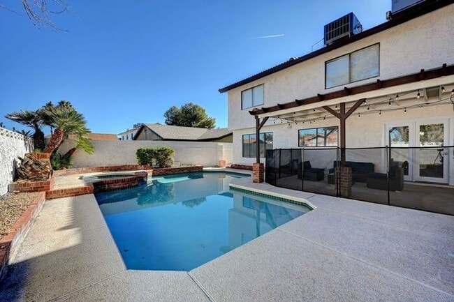 Building Photo - Fully Furnished Entertainer’s Dream with Resort-Style Pool & RV Parking!