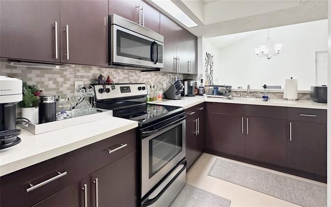 Building Photo - 18870 NW 57th Ave Unit #305