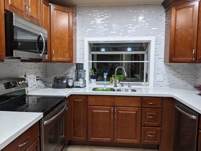 Kitchen - 701 136th Plz NE Condo