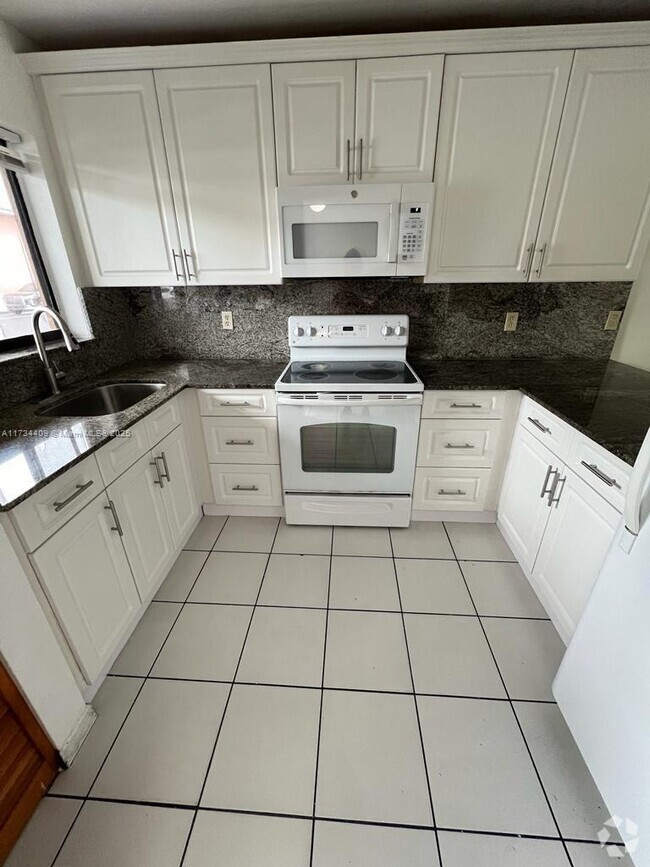 Building Photo - 6011 W 24th Ave Unit A-110 Rental