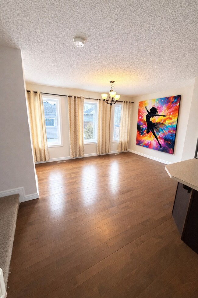 Photo - 16035-16011 11 Ave SW