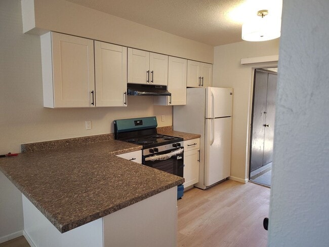 Photo - COMING SOON Newly Remodled -2BR Unit with Fenced back yard