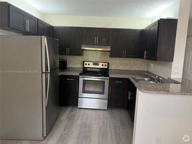 Building Photo - 11633 Royal Palm Blvd Unit 11633 Rental