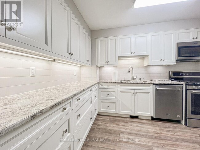 Photo - 711 Osgoode Dr