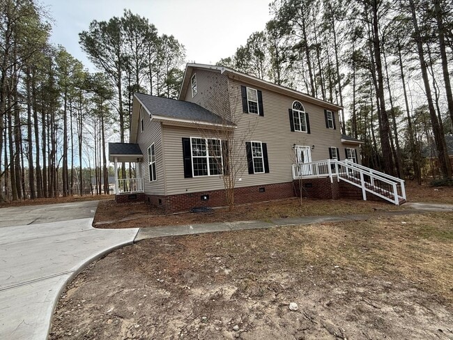Photo - Private 4BD, 2.5BA Fuquay Varina Home on a Large Lot with a Fenced Yard and First Floor Master Be...