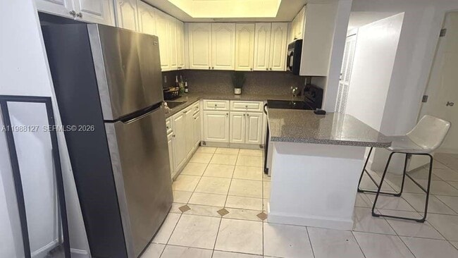 Building Photo - 3090 Coral Springs Dr Unit 1