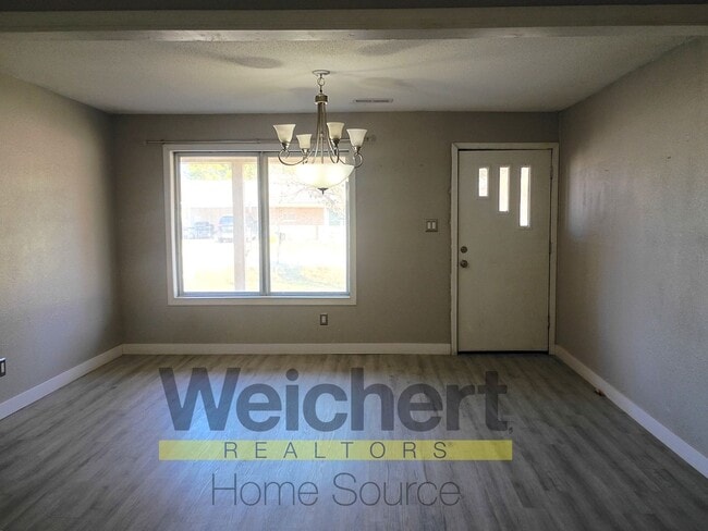 Photo - Updated 4-Bed Home with Fenced Yard & Carport