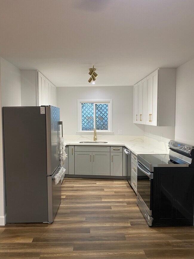 Kitchen with stainless steel appliances. - 45-236 Popoki Pl