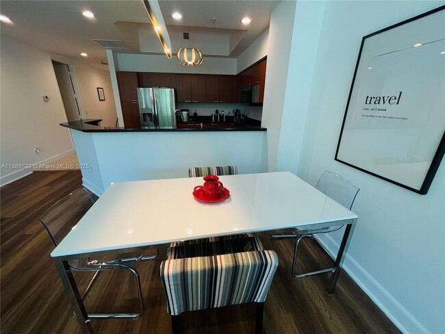 Building Photo - 15051 Royal Oaks Ln Unit 102