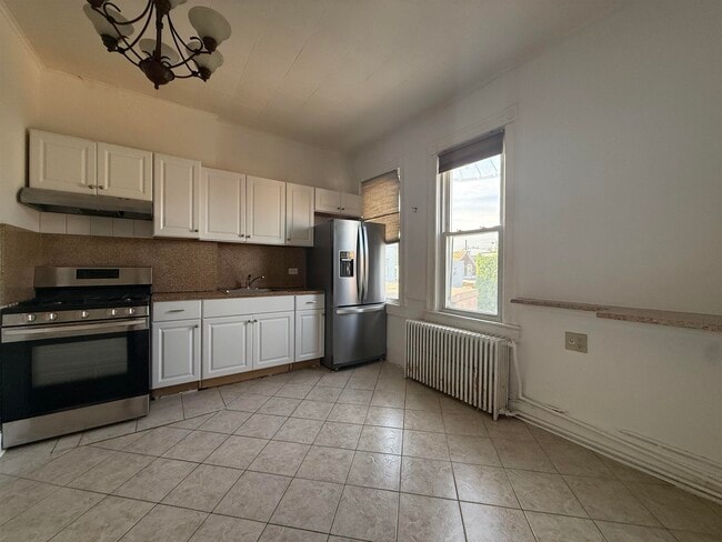 Building Photo - 606 59th St Unit 2