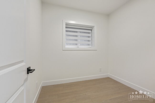 Photo - Modern 2-Bedroom Basement Suite on 16th Av... Unit Basement