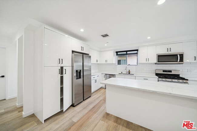 Photo - 837 N Harvard Blvd Unit 837 1/2