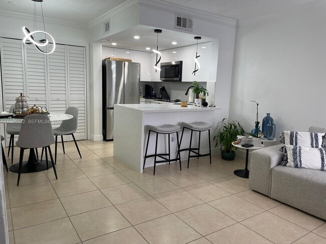 Building Photo - 8675 NW 5th Terrace Unit 13-204