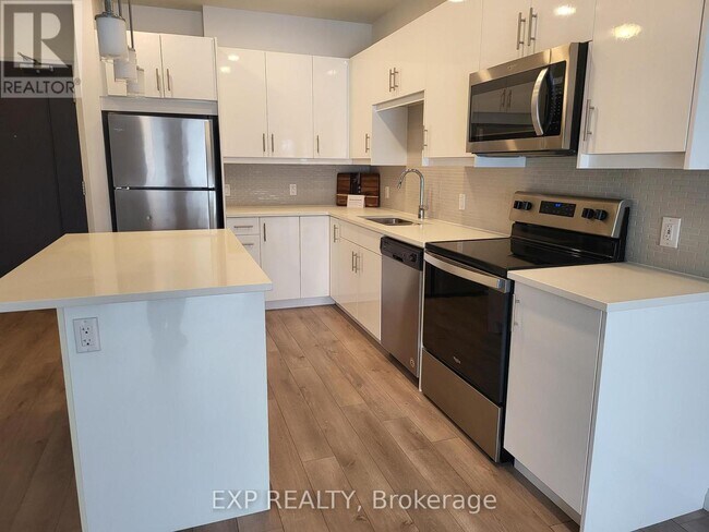 Photo - 144 Watson Rd N Unité 607