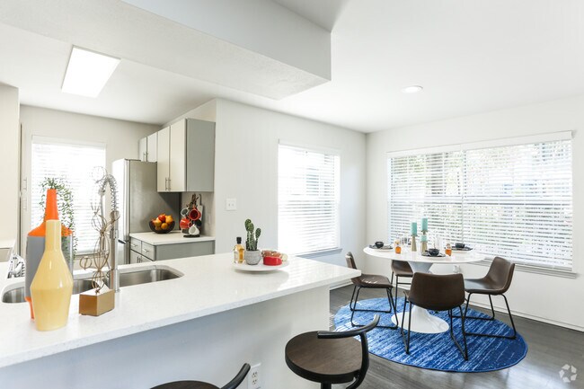 2BR, 2BA - 1035SF Dining Room & Kitchen Bar - NOAH Apartments