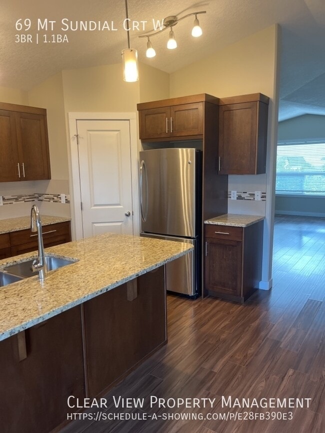Photo - Sunridge West Side Duplex with Granite Counters!