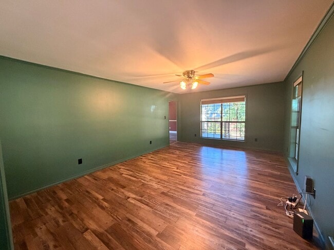 Photo - Discover this spacious 4-bedroom, 2.5-bathroom home in Russellville, AR