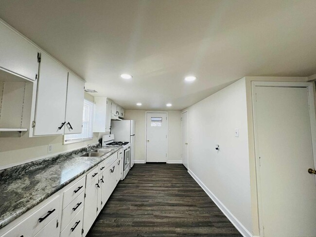 Photo - Freshly Updated Single-Family Home with Spacious Upper Bedroom