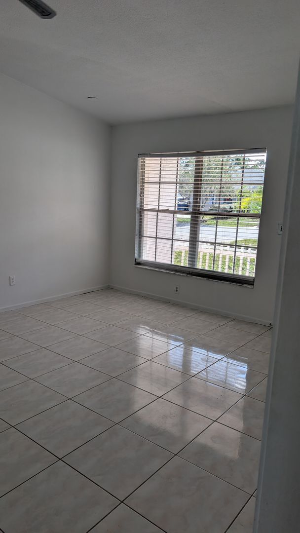 Photo - Charming 2 Bedroom Duplex with Tiled Flooring and Patio Space