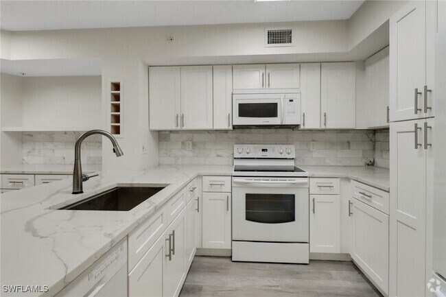 Building Photo - 1220 Wildwood Lakes Blvd Unit 108 Rental