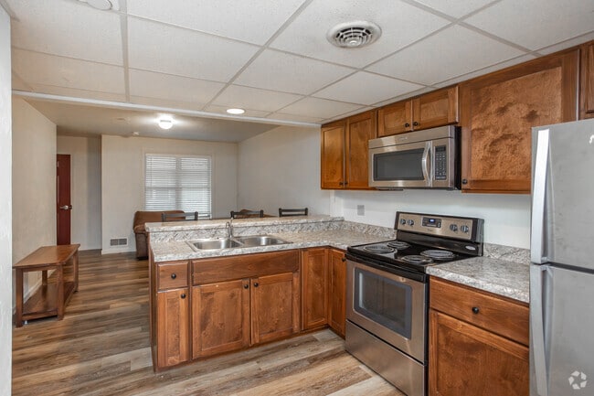 3BR, 2BA - 1,238SF - Kitchen - The Cottages on Campus