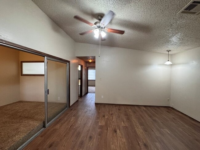 Photo - 2 bed duplex with 1 1/2 baths, bonus room and a 1 car garage for lease in SW OKC! (no fenced yard)