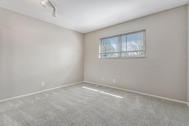 Photo - Charming Townhouse with Gas Fireplace & Basement Retreat in Columbine Lakes Community!