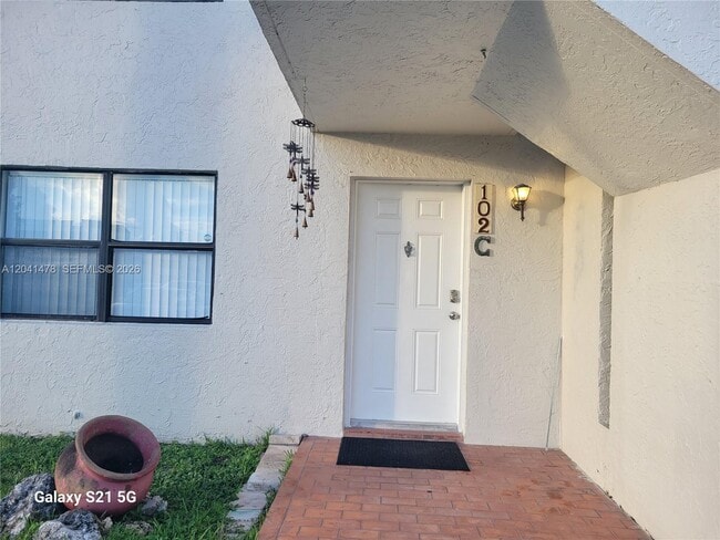Building Photo - 14831 SW 80th St Unit 102-4