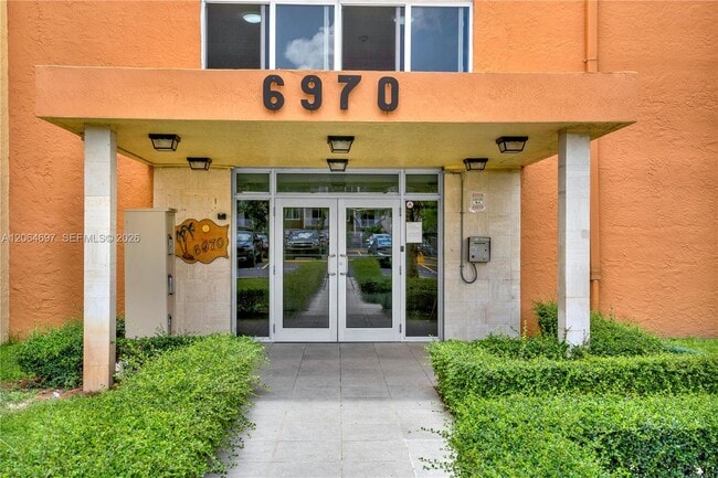 Building Photo - 6970 NW 186th St Unit 3-409A