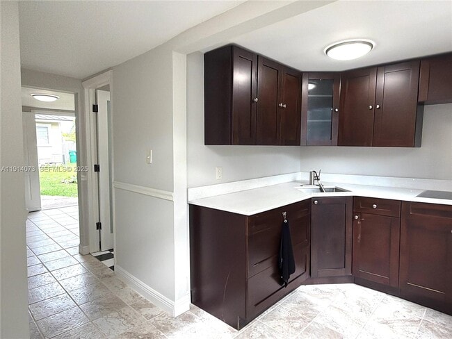 Photo - 1350 SW 13th St Unidad Rear-Ground Floor