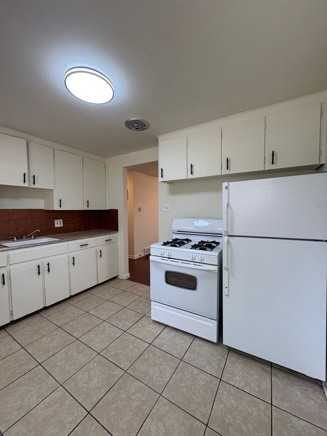 Building Photo - 7517 W 8th Pl Unit 7517