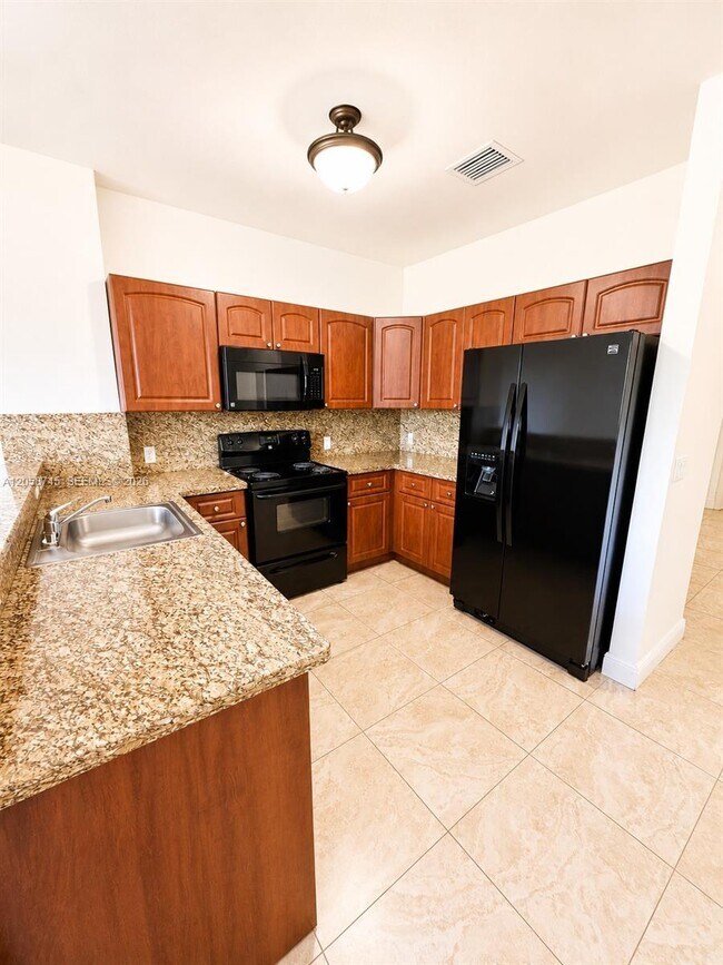18120 NW 59th Ave Unit 202