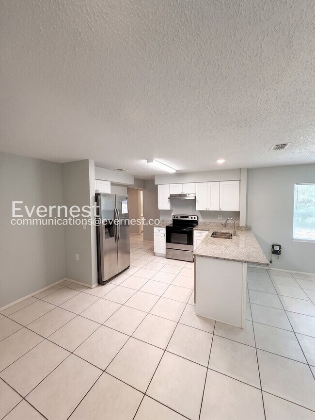 Photo - 3 Bed, 2 Bath Home with Spacious Yard and Attached Garage for Rent / Available Soon!