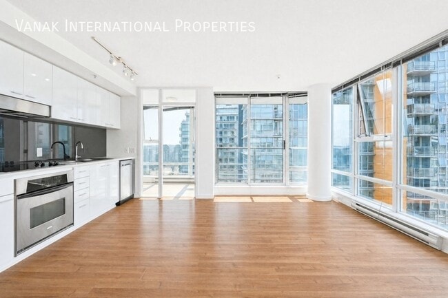 2 Bed + Den + Solarium | 2 Bath | Parking | Spectrum