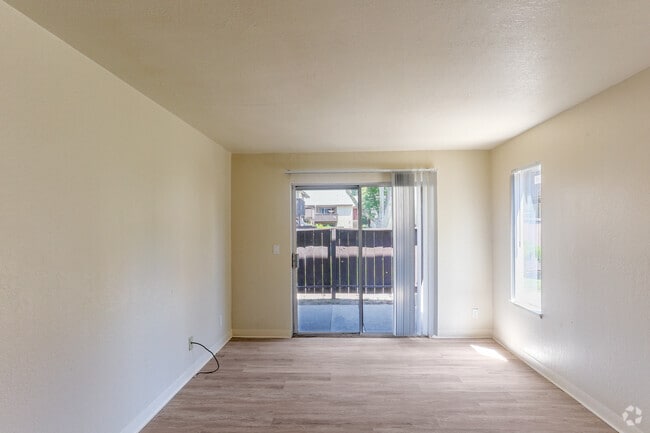 2BR, 1BA - 765SF - Living Room - Blossom Oaks Apartments