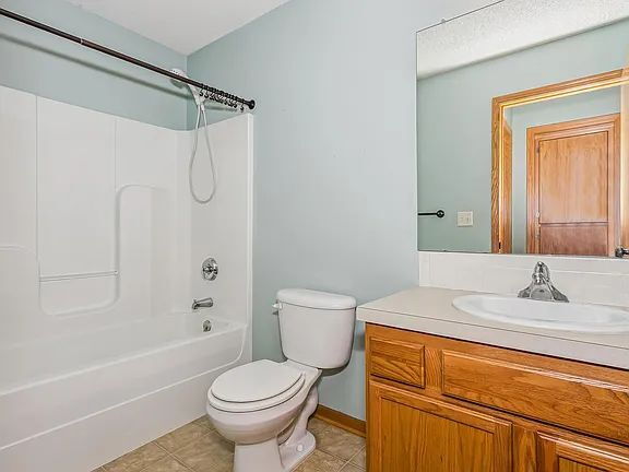 Photo - "Spacious 4-Bedroom Family Home with Cozy Fireplace in Wichita - 2261 Sq Ft of Comfort!"