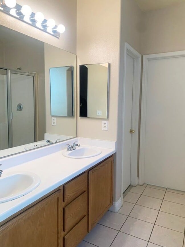 Photo - Single story 3 bed 2 baths property inside the gated Cactus Springs community! Home has all LVP a...