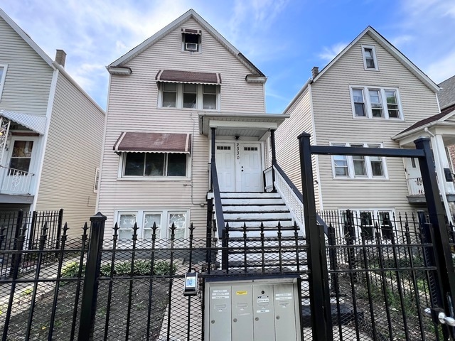 Building Photo - 2330 N Lockwood Ave Unit 1