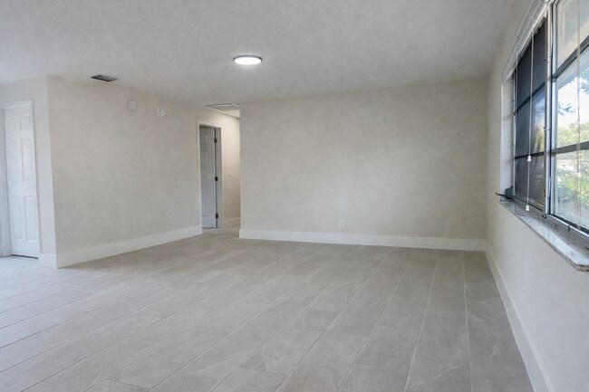 Photo - Beautifully Fully Remodeled 3-Bedroom Home with Carport, Indoor Laundry & Huge Fenced Yard!