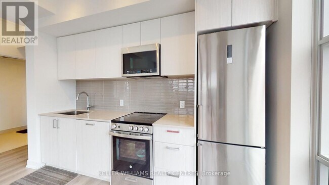 Photo - 1787 St Clair Ave W Unité 309