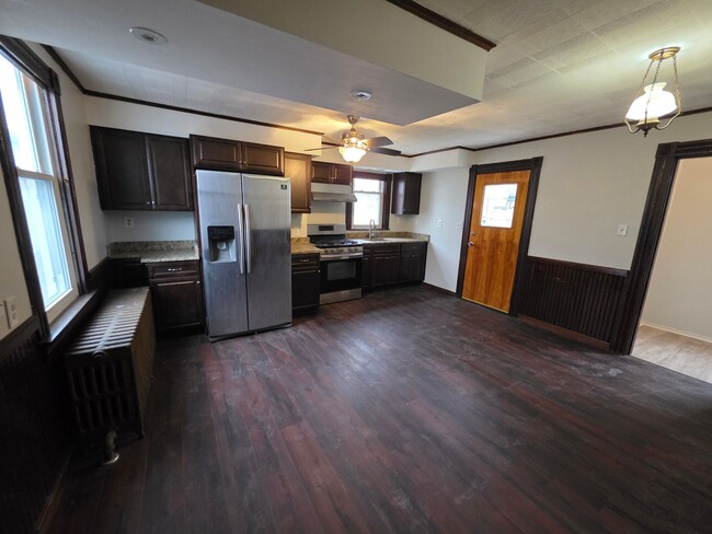 Photo - Spacious 3-Bedroom Home with Granite Countertops & Huge Eat-In Kitchen