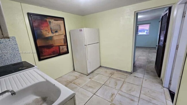 Photo - 701 Tamiami Canal Rd