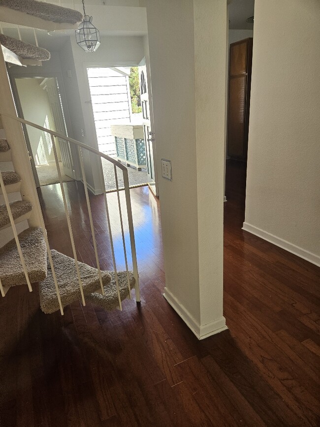 hall way to entry door, kitchen - 7532 Seaspring Dr Unit 204