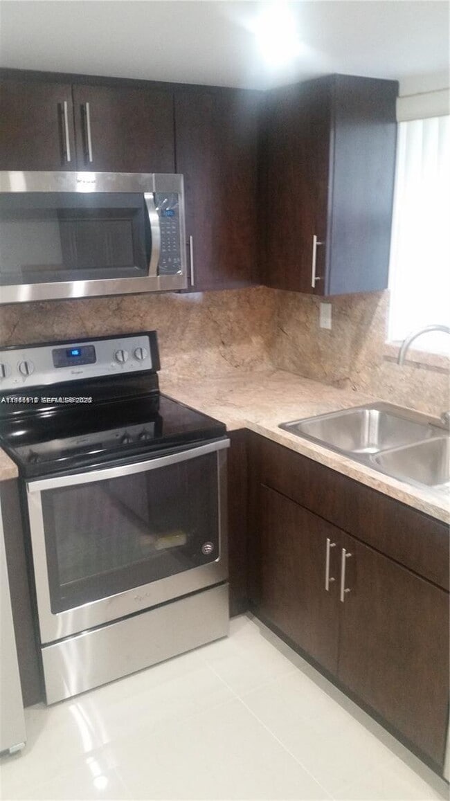 Building Photo - 9351 Fontainebleau Blvd Unit B117