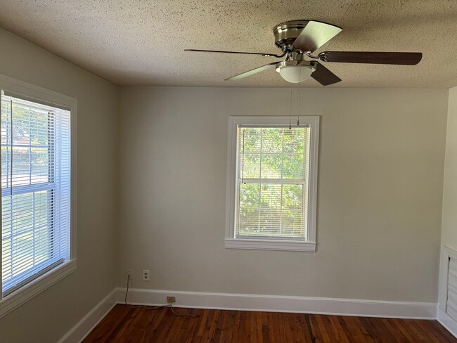 Photo - 2 bed / 1 bath home for rent in a great location. Features fresh flooring, new paint, and a fence...