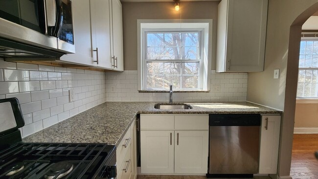 Building Photo - 7754 Kingsbury Blvd Unit 1
