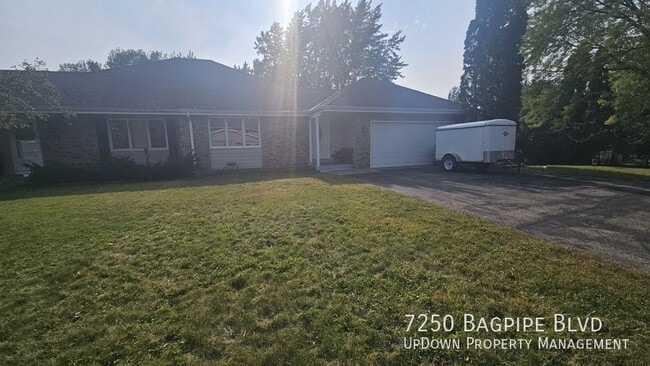 Building Photo - 7250 Bagpipe Blvd Rental